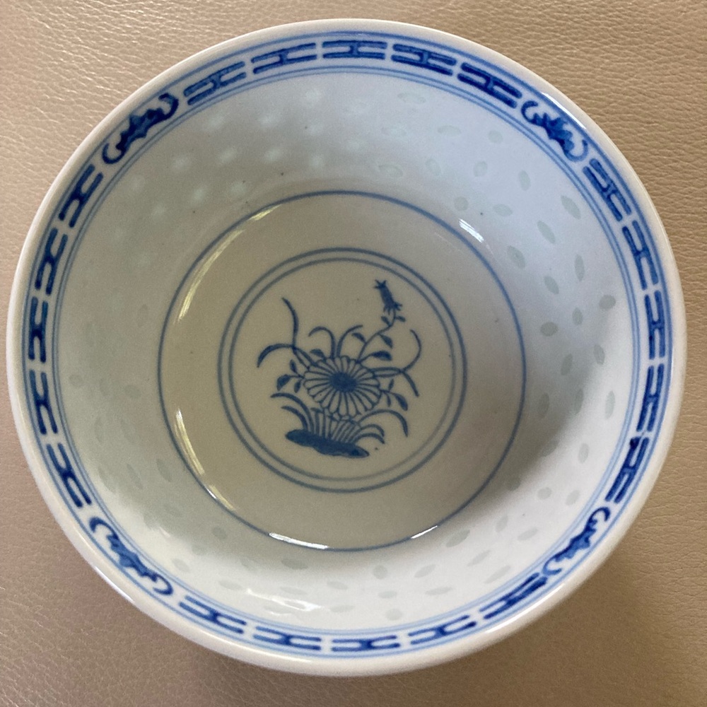 Blue and White Ceramic Jingdezhen rice grain porcelain bowl.
